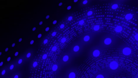 Animation-of-spinning-blue-glowing-circles-on-black-background