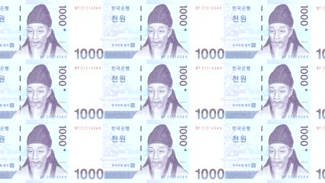 banknotes of one thousand wons of south korea rolling, cash money, loop