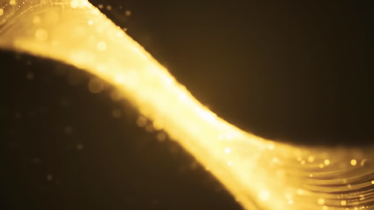 Golden particles dance gracefully, creating a mesmerizing display that captures the beauty of light in a tranquil setting at dusk. The atmosphere is calm and enchanting, inviting viewers to relax.