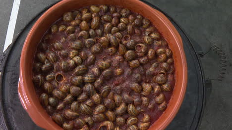 Snails in Red Sauce