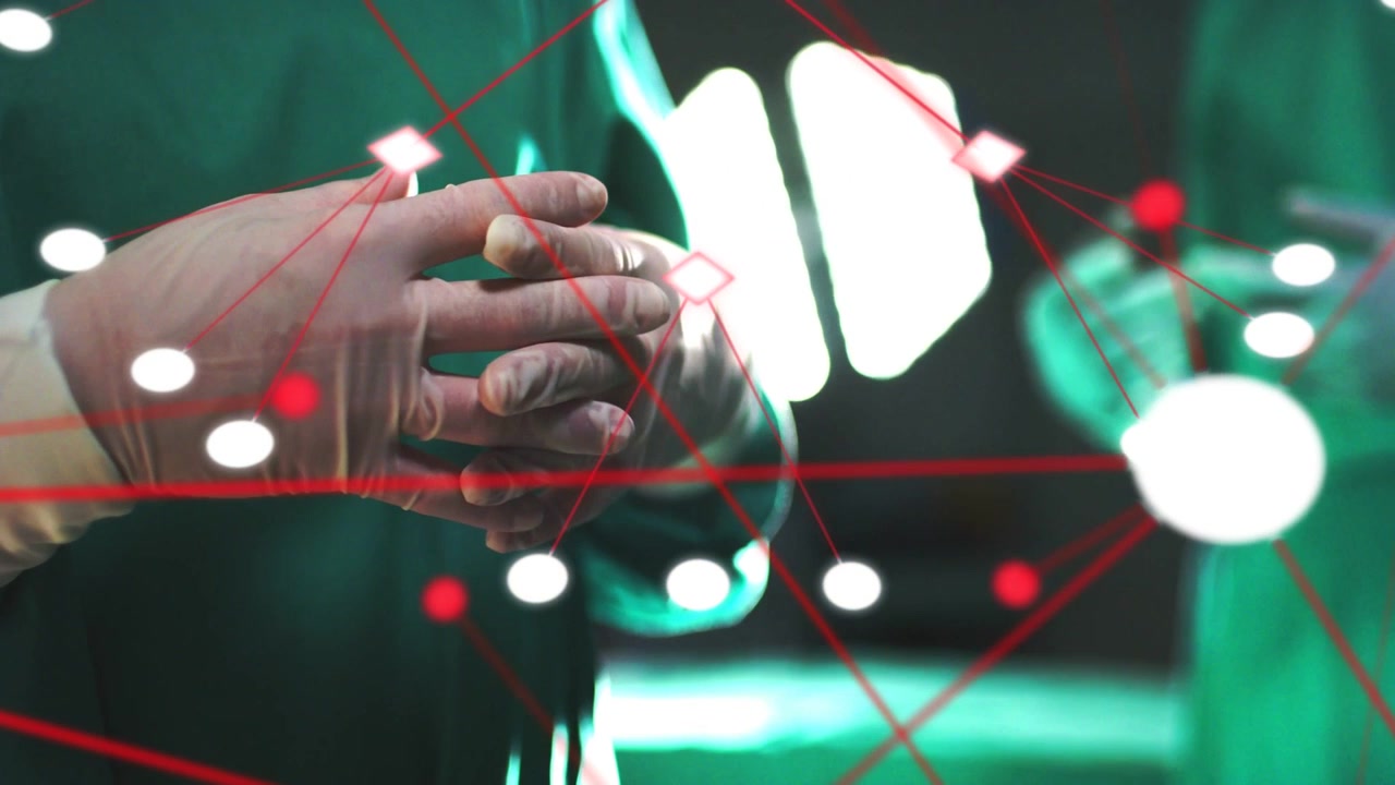 Surgeon adjusting gloved hands as red overlay emerging under surgical lights, preparing for surgery