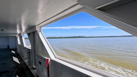 scenic river view from a moving boat