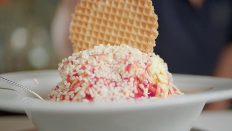 Delicious-Italian-Spaghetti,-Vanilla-Ice-Cream-Covered-By-Strawberry-Sauce-And-White-Chocolate