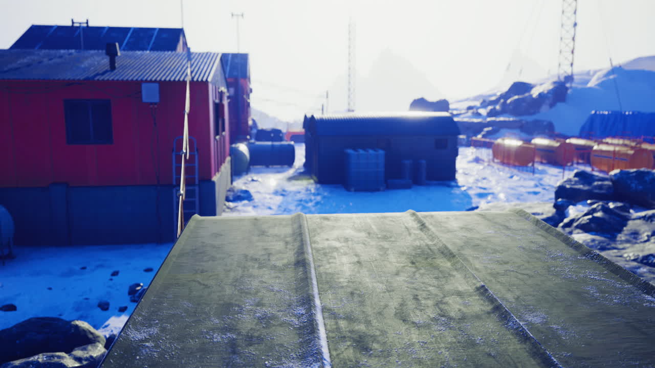 Winter at the remote research station surrounded by icy landscape at dawn