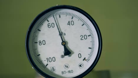 thermometer at a factory, close up.