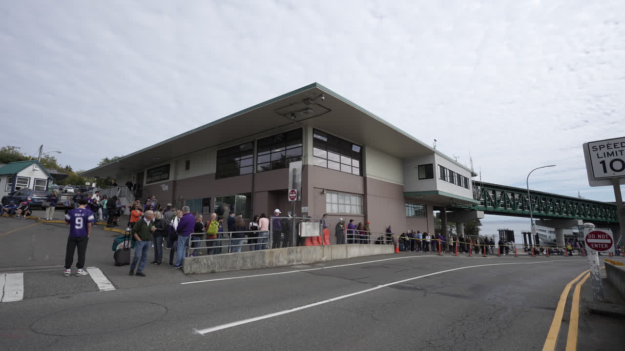 People Waiting in Line at a Ferry Terminal