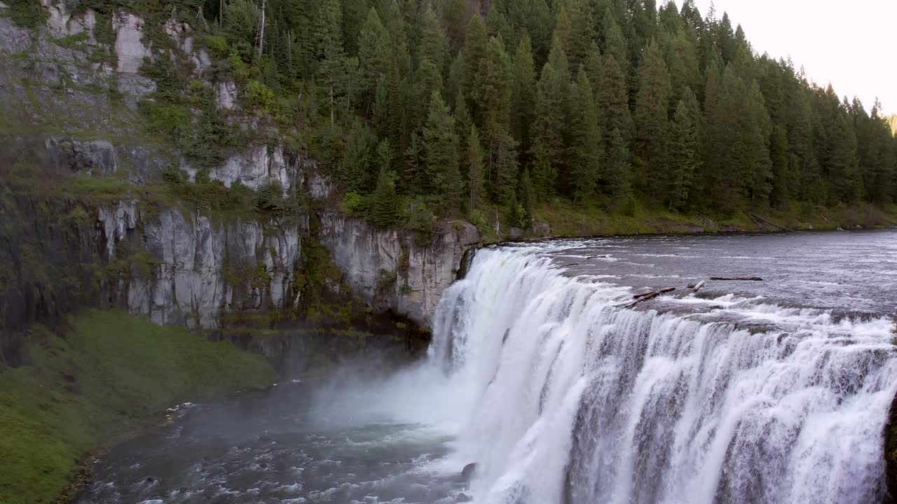 Drone Aerial of the Upper Mesa Falls, a thunderous curtain of water &ndash; as tall as a 10-story building Near Island Park, and Ashton, Idaho
