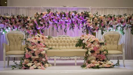 an amazing shot of a gorgeous stage set up at a traditional wedding