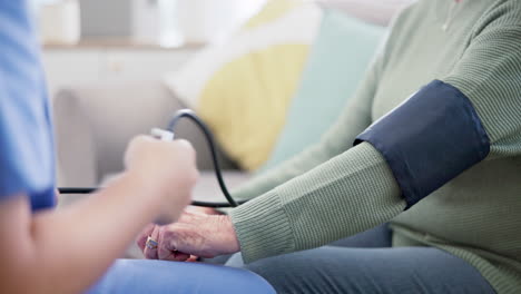 Blood-pressure,-test-and-hands-of-caregiver-help