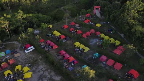 aerial view, neatly lined up tents camping on the klangon hill of mount merapi