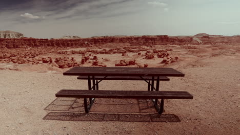 picnic table in a desert landscape