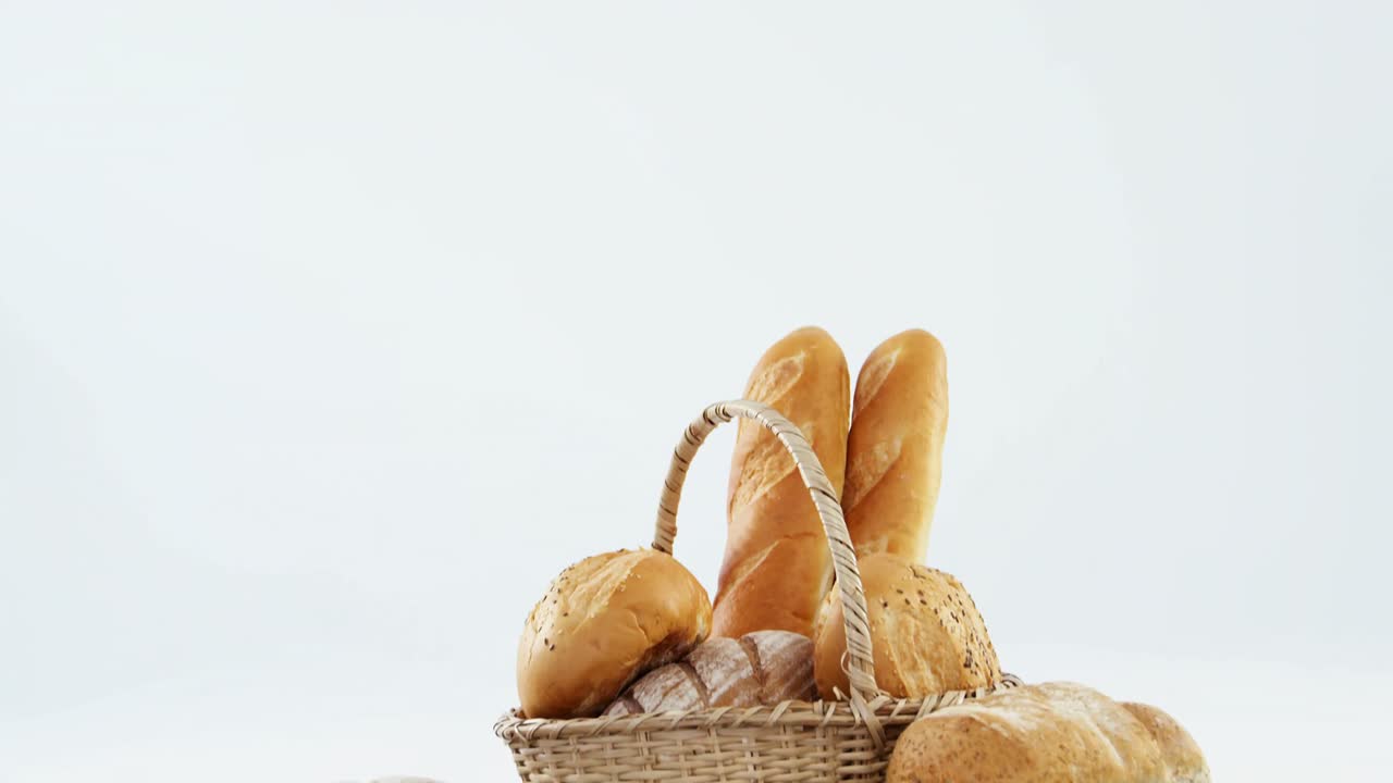 Various types of bread in wicker basket