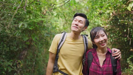 couple hiking in the forest