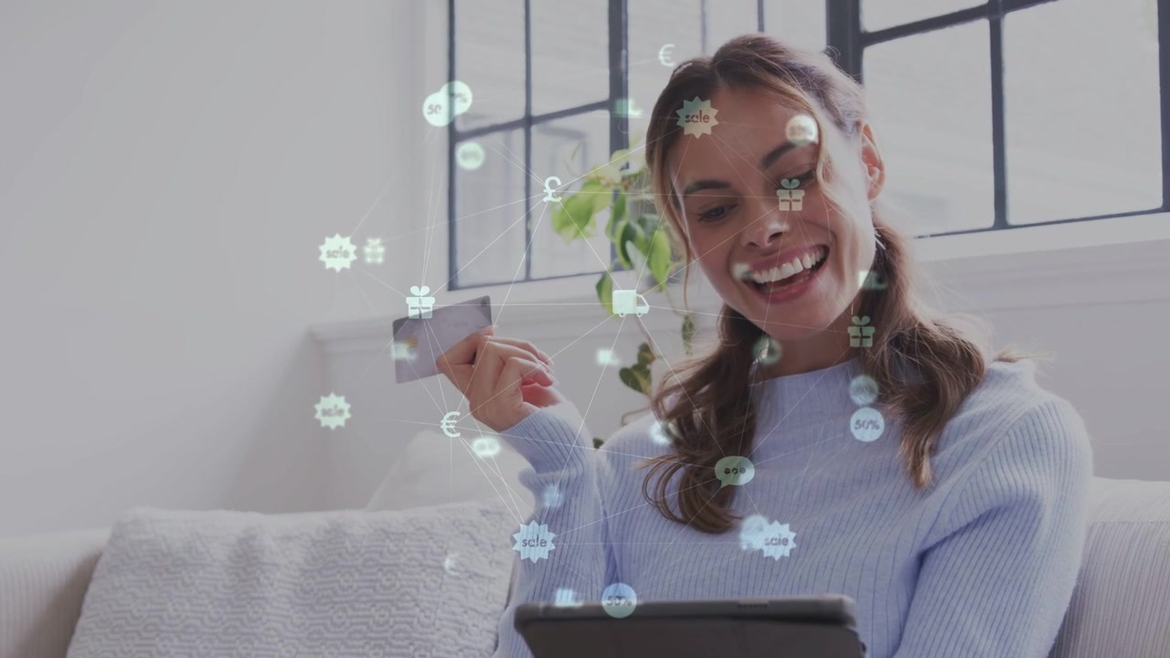 Donna che tiene una carta dopo aver consultato un tablet, toccando per confermare l'ordine mentre le icone finanziarie si animano.