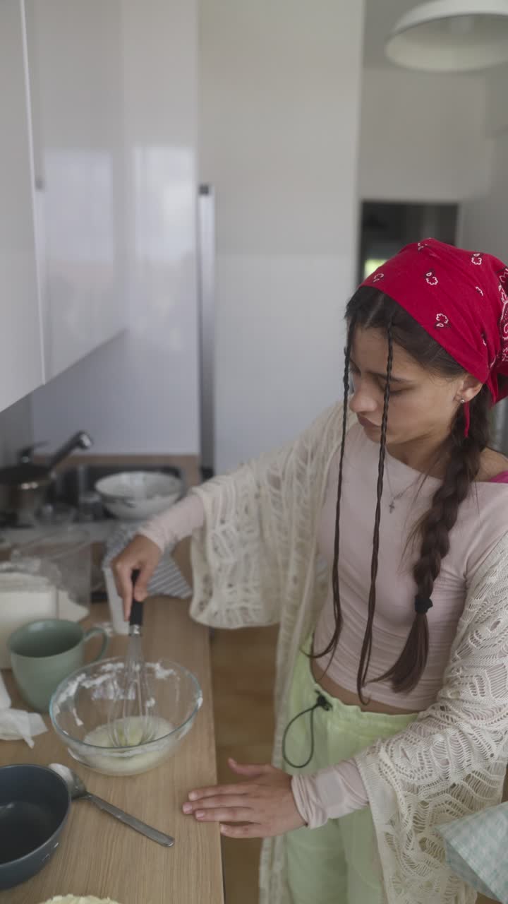 Young Woman Baking in a Kitchen