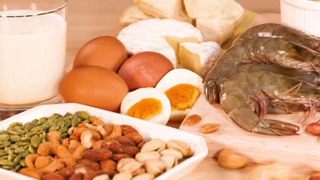 variety of protein sources on wooden background