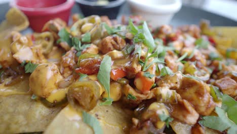 chicken nachos with cheese and vegetables