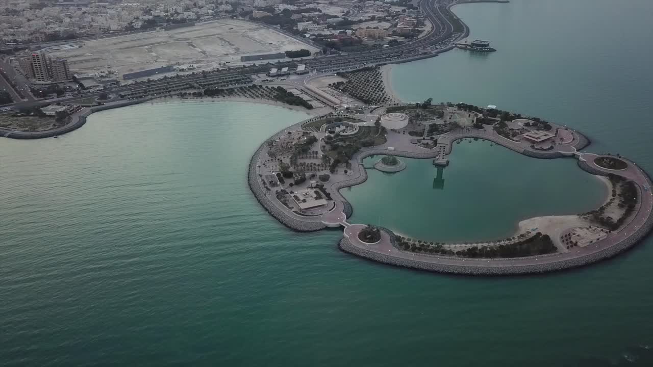 Kuwait’s Artificial Green Island. Slow Pan Aerial Shot