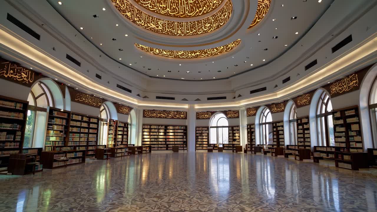 Wide shot capturing a serene Islamic library adorned with Arabic calligraphy illuminating the ceiling and walls, filled with bookshelves of literature and knowledge