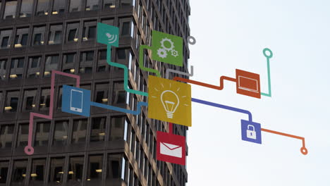 colorful technology icons and network connections animation over office building