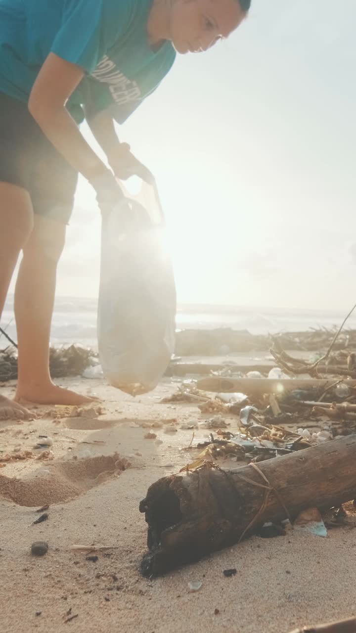 Volunteer effort to clean beaches and combat pollution in the coastal sunset