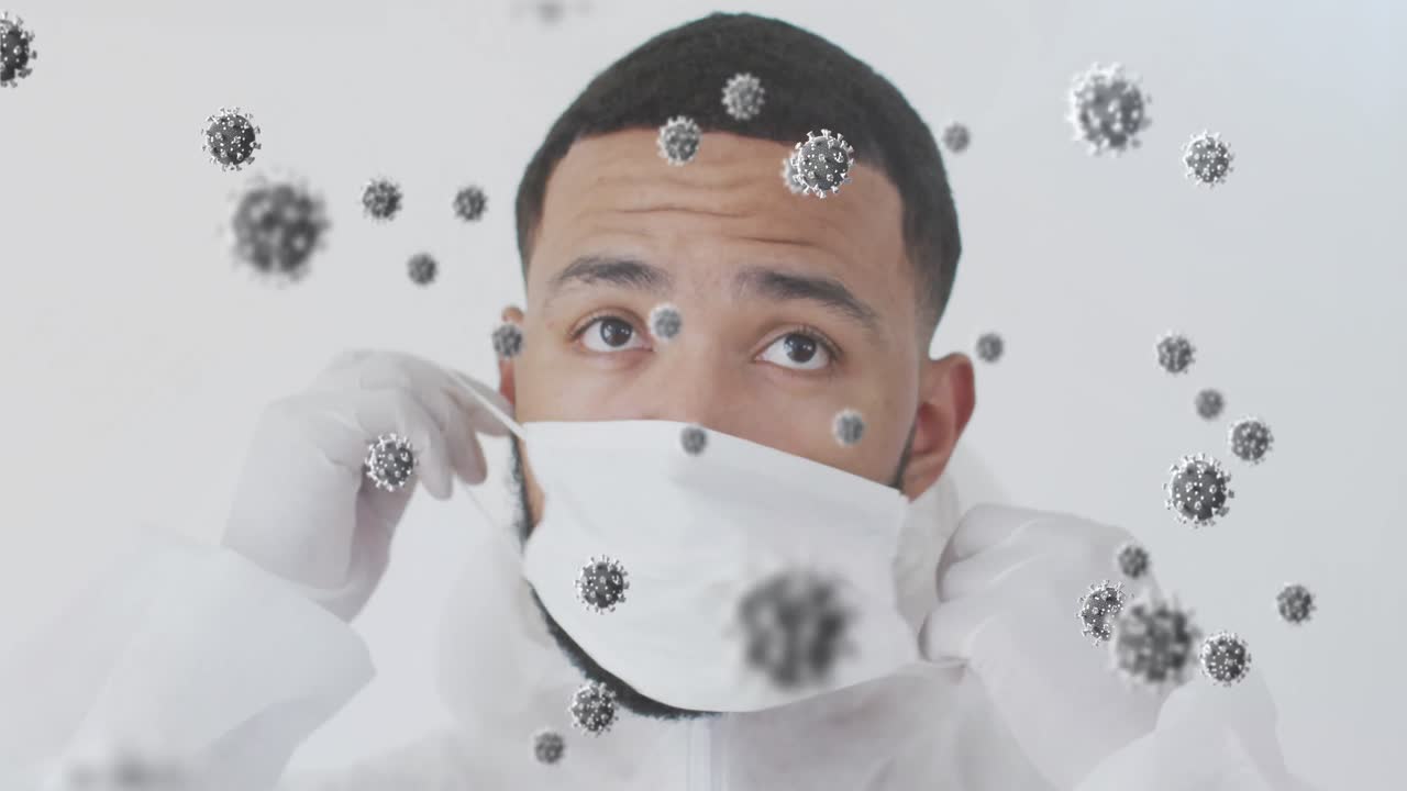 animación de células de virus sobre un hombre de dos razas que lleva una máscara facial