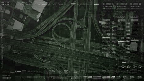 Futuristic-HUD-satellite-view-of-traffic-surveillance-on-a-busy-expressway-junctions-tracking-and-monitoring-highway-traffic-for-possible-target-vehicle