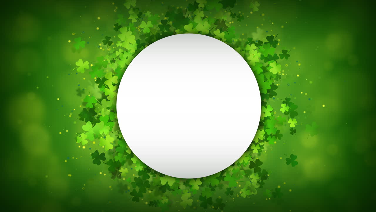 St Patrick's day background with green clover round frame on loop background. Looped animation with flying particles. Copy space.