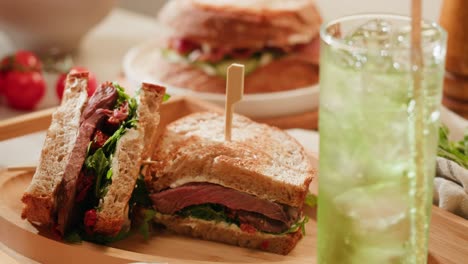 beef sandwiches and iced drink
