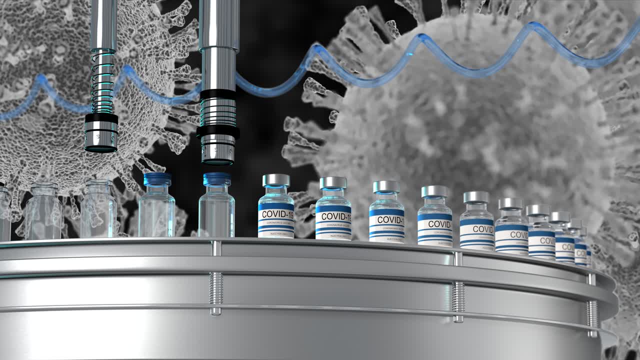 SARS-COV-2 COVID-19 Mass production of coronavirus vaccine, a machine pours the vaccine, seals bottle caps into ampoules moving along a pharmaceutical conveyor belt in a research laboratory