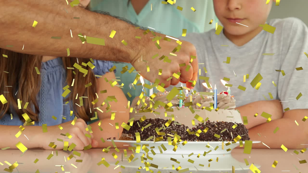 생일 파티에서 즐겁게 지내는 가족 위에 떨어지는 콘페티의 애니메이션