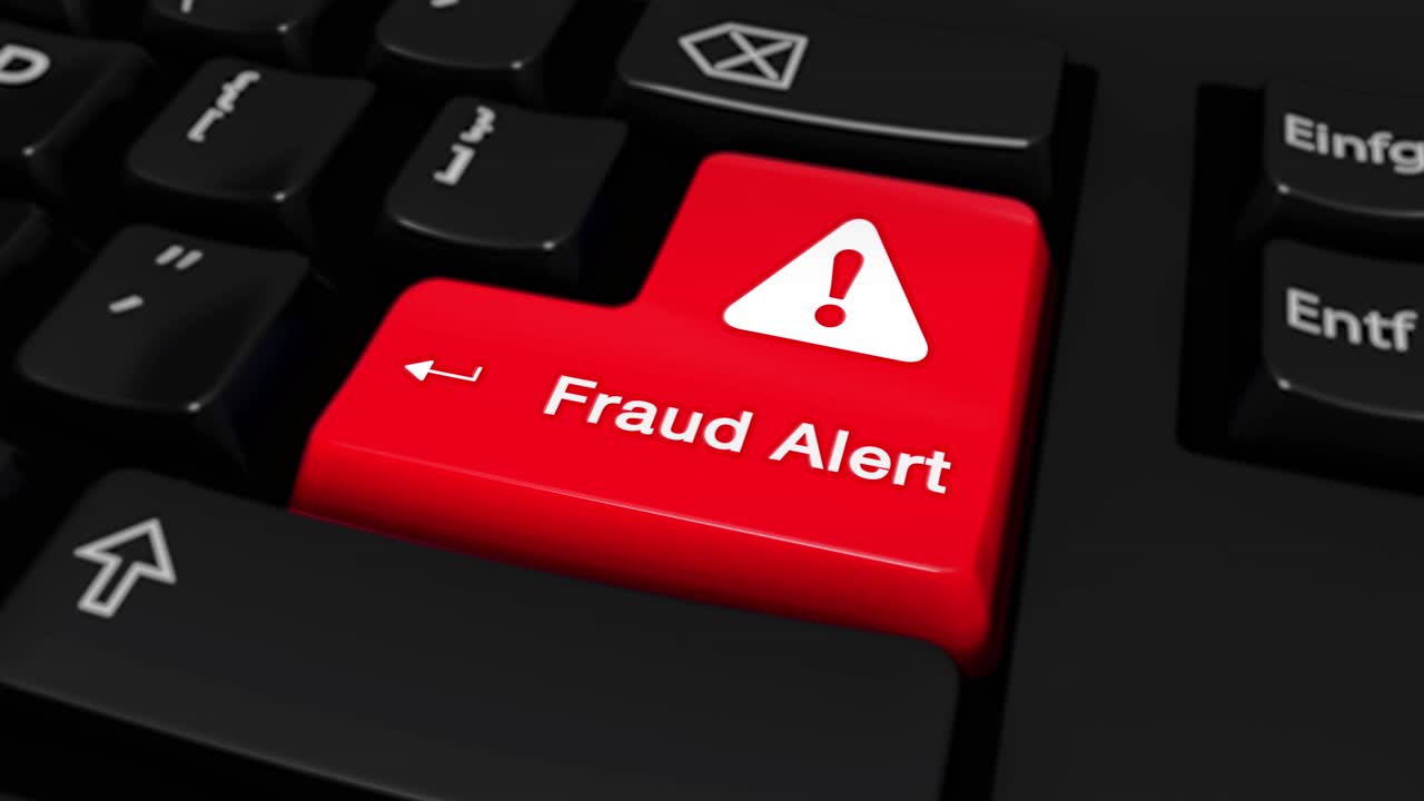 105 fraud alert round motion on red enter button on modern computer keyboard with text and icon
