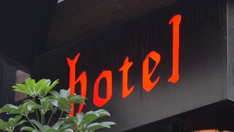 hotel sign with plants