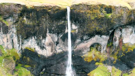 zoom in to large waterfall in iceland