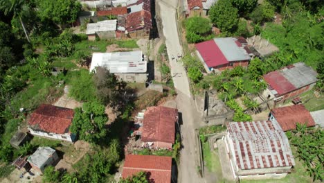 a rural town in el guapo, miranda, venezuela, showcasing houses and greenery, aerial view