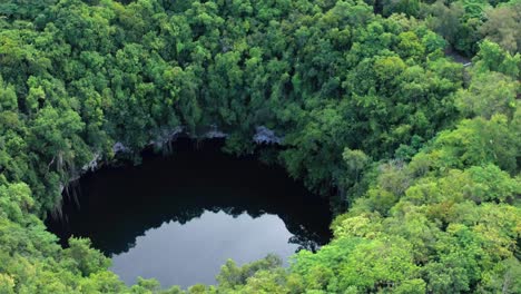 Drone-flight-in-Los-Tres-Ojos-cave-in-Mirador-del-Este-park,-Santo-Domingo-Este,-Dominican-Republic,-these-caves-have-indigenous-Taino-writing