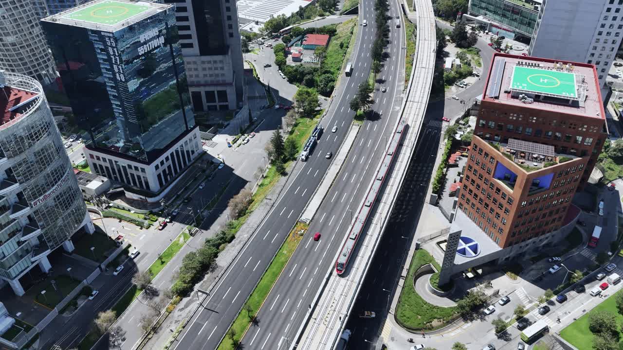 Overhead shot of intercity train from Mexico City to Toluca traveling through Santa Fe