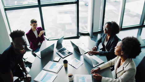 diverse business team collaborating in a conference room