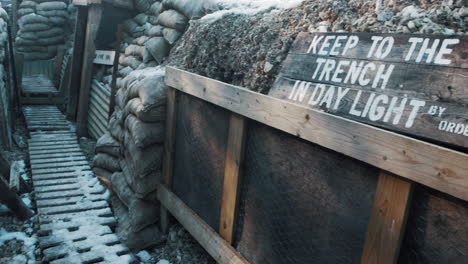 first world war keep to the trench in daylight sign in a ww1 trench dug out in france