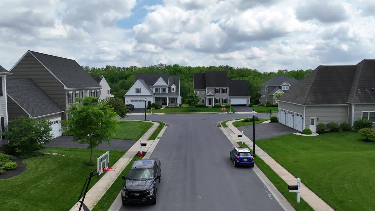 Residential Street with Houses and Cars