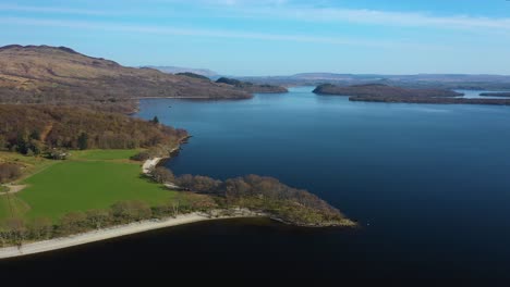 aerial flight over coast of loch lomond, scotland