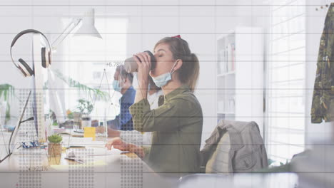 animation of statistics with colleagues working in office wearing face masks