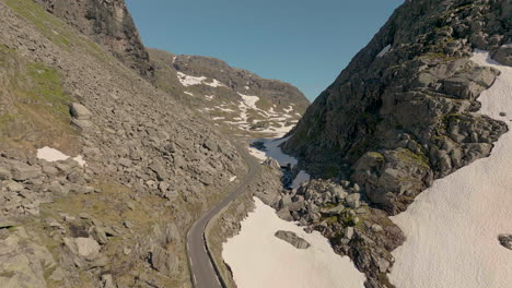 Fly-Over-Old-Mountain-Road-On-Sunny-Day