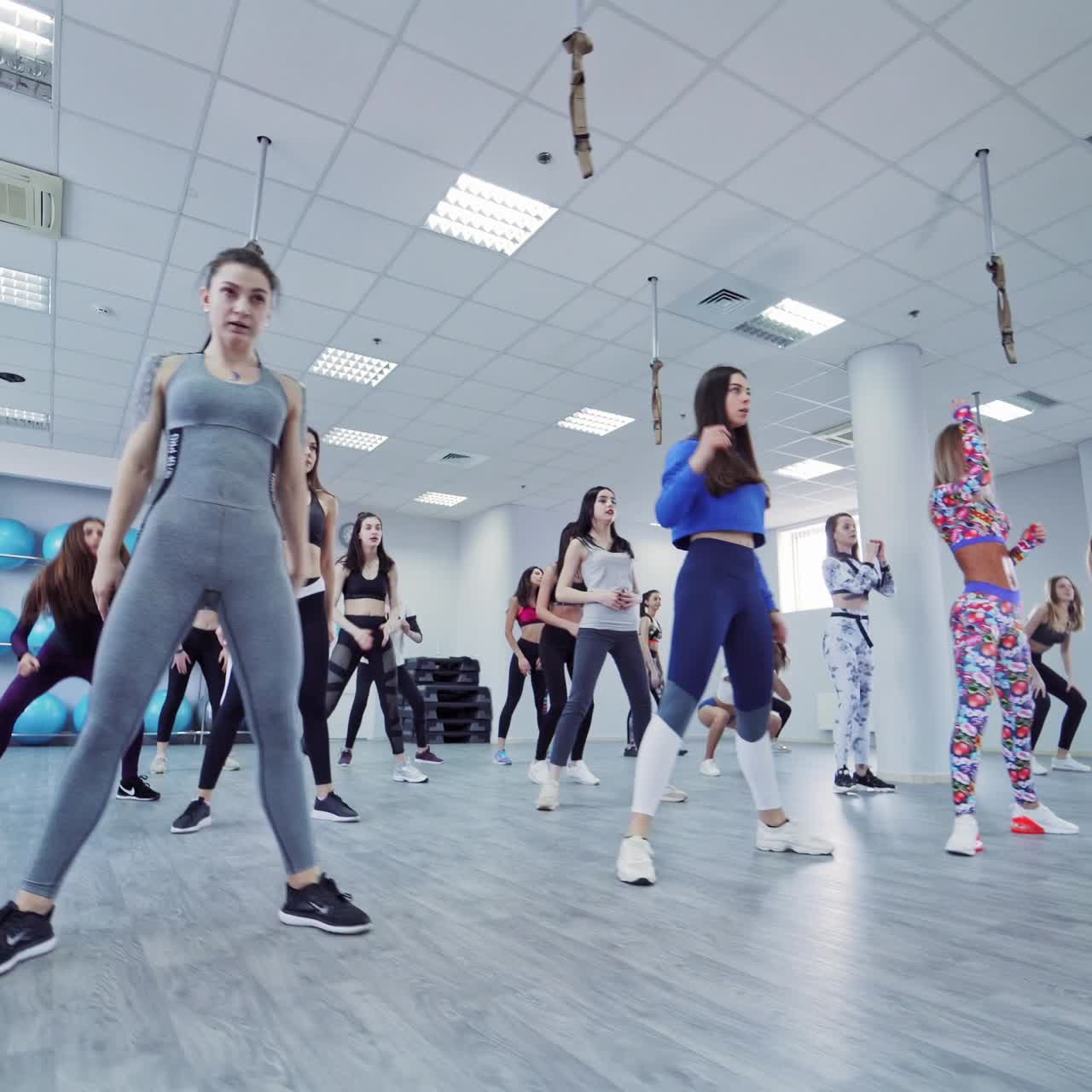 Group of women exercising in gym