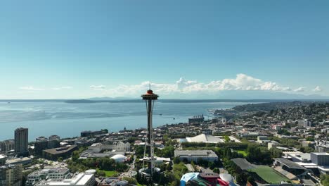 Aerial-view-orbiting-the-Seattle-Space-Needle-on-a-bright-summer-day