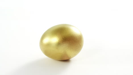 golden easter egg on white background