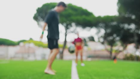 People exercising on a grass field