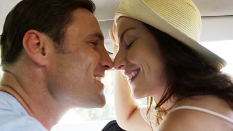 Couple-interacting-with-each-other-in-the-car