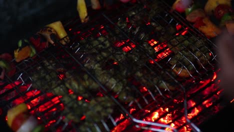 close up of barbecue grill with veggie skewers