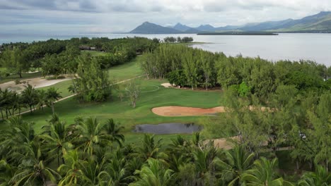 luxury golf course and helipad on mauritius island, aerial view